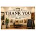 A mockup of a gallery wall print featuring the text 'THANK YOU WE REALLY APPRECIATE YOU' in dark brown lettering, decorated with olive branch motifs and a small framed art icon. The print is shown installed in a warmly lit art gallery with paintings, a bench, and a chalkboard sign.